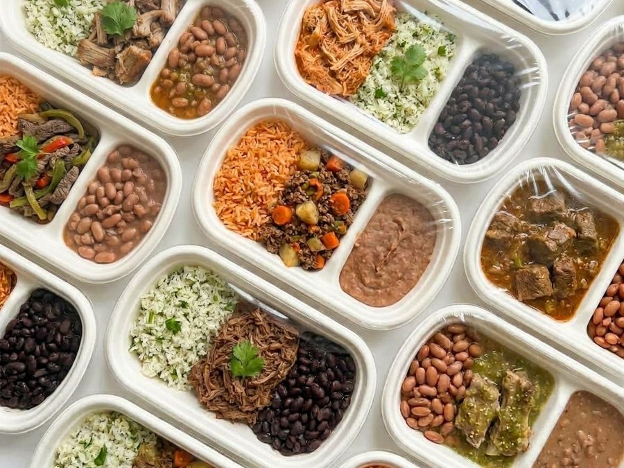 Sealed trays of portioned Mexican meals